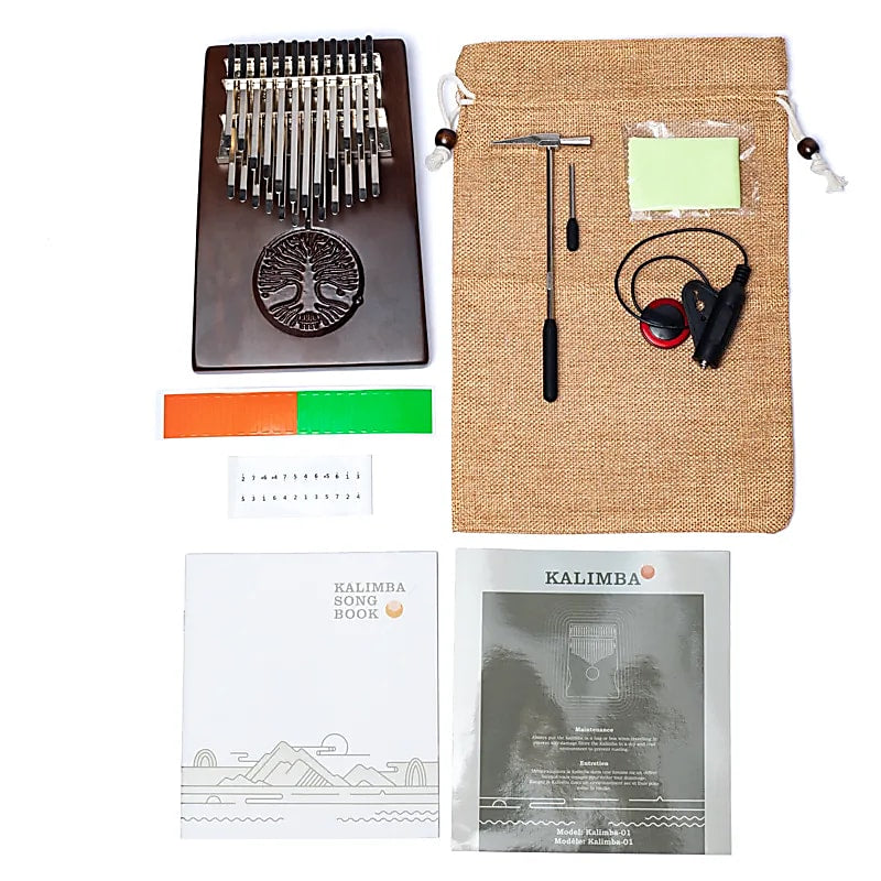 Kalimba/ Hluru or 'finger piano'! 24 notes, made of American walnut wood. Sold with a microphone. Decorated with a carved Tree of Life. Comes with a cloth bag and a tuning hammer!