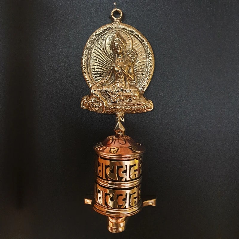 A selection of authentic 18-centimeter tabletop prayer wheels made in Nepal with Green Tara. Beautiful quality, these are magnificent little works of art!