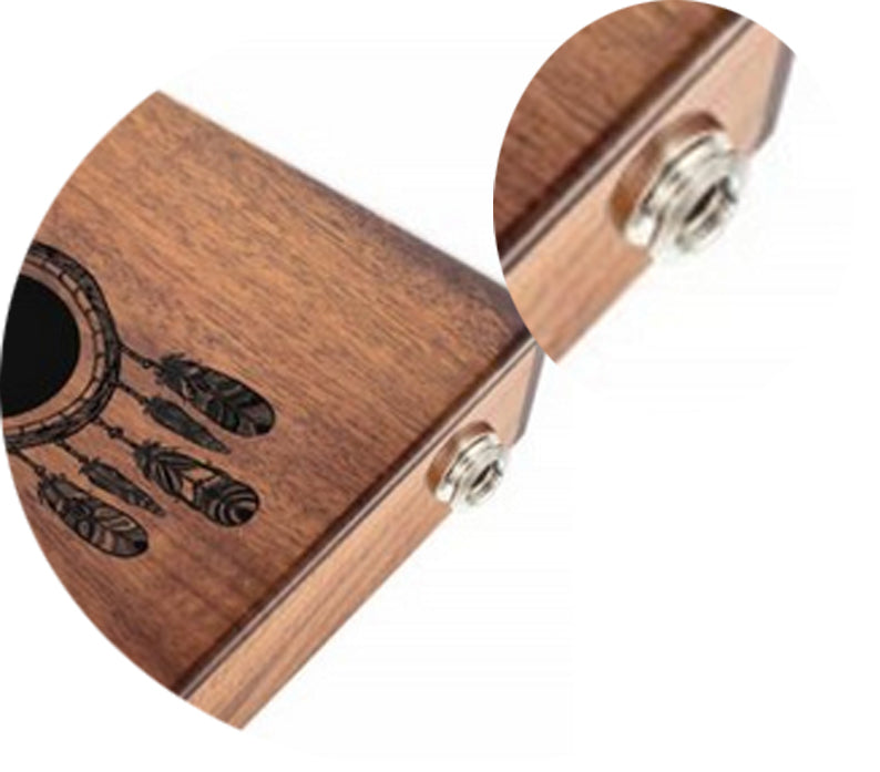 The kalimba or finger piano! 17 notes, made of koa wood (tropical resonance wood) in the key of C major. Decorated with a carved Indian motif and comes with a cloth bag and a tuning hammer! 23x19x7.5 cm!