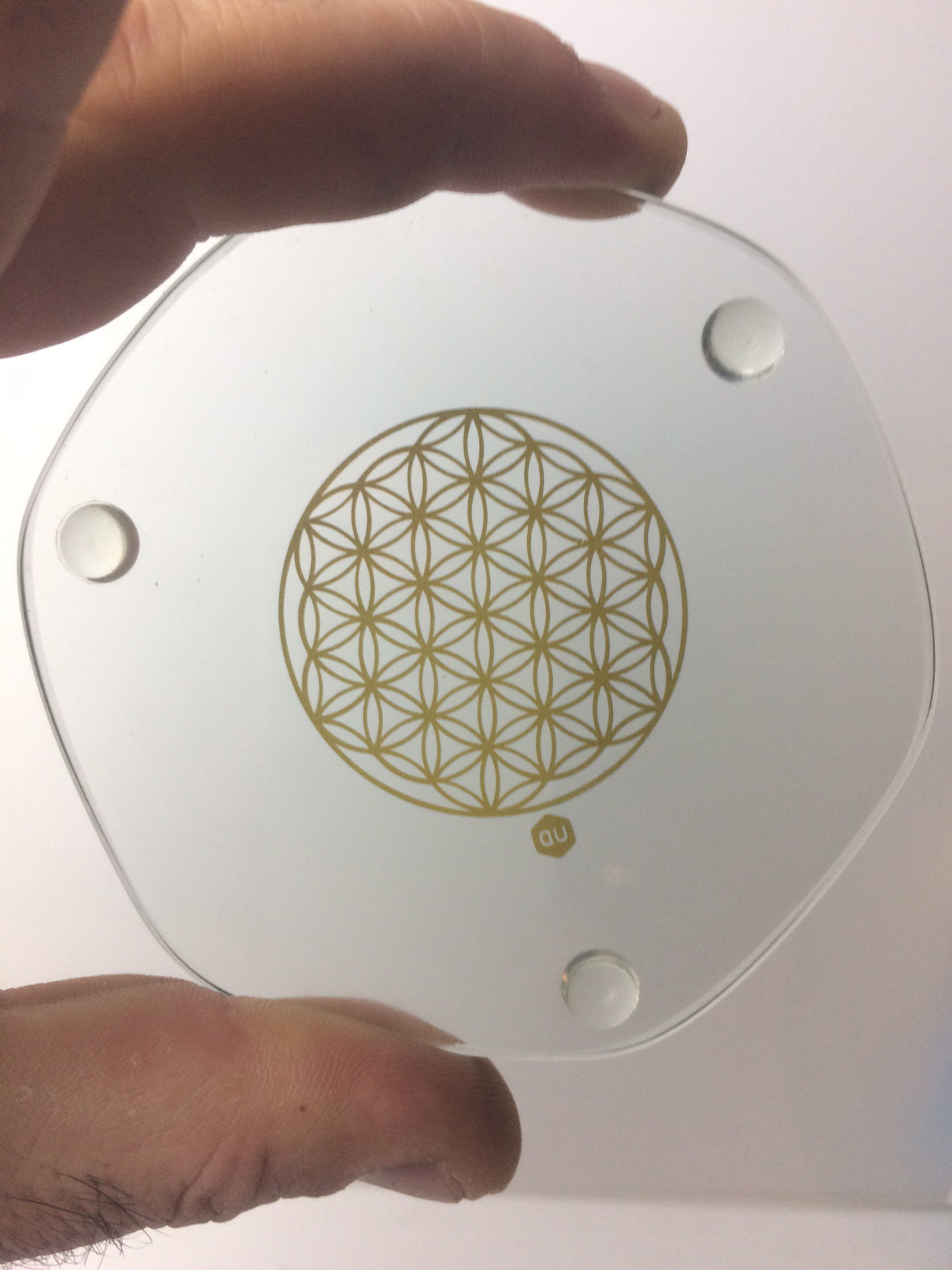 Energyplate (sous-verre et dessous de plat) de chez 'natur design', de 9 ou 22 centimètres. Avec gravure de la fleur de vie en Or 23,8 carats. Verre sans plomb ni métaux lourd !