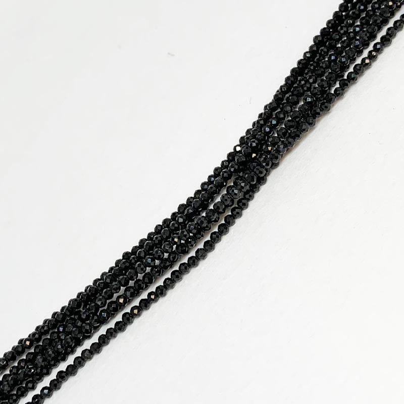 Black spinel from India! Multi-strand bracelet (7), silver finish and 2/3 millimeter faceted beads. Length 21.5 centimeters. AA to AAA quality!