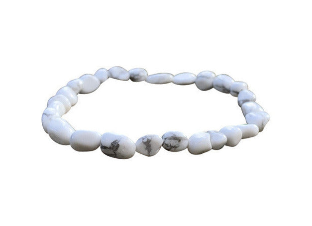 Howlite, bracelet de 17 à 21cm, collier de 42cm et sautoir de 60cm. Perles de type 'Graine' de formes naturelles montées sur fil de haute résistance !