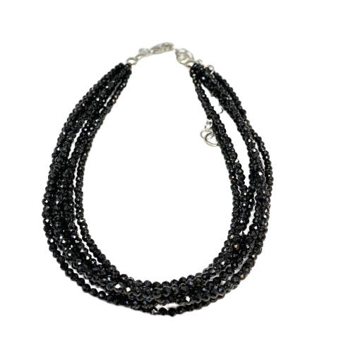 Black spinel from India! Multi-strand bracelet (7), silver finish and 2/3 millimeter faceted beads. Length 21.5 centimeters. AA to AAA quality!