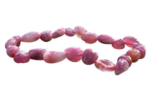 Pink tourmaline called 'Rubellite', bracelet from 17 to 21cm, necklace from 42cm and sautoir from 60cm. Naturally shaped 'Seed' type beads mounted on high-strength wire!