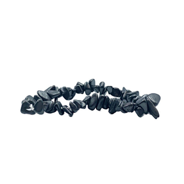 Hématite, bracelet de 17 à 21 cm ou en collier de 42 cm ou sautoir de 85 cm. Perle de type 'baroque/ chips' de 4/7 millimètres, montées sur fil élastique ou fil d'acier de haute résistance !