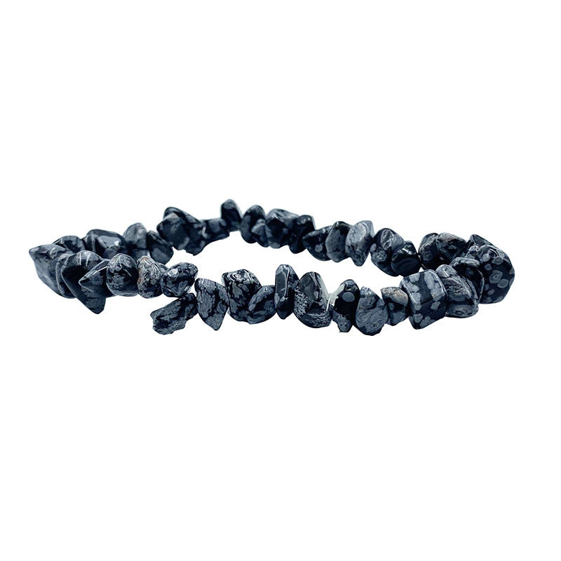 Obsidienne neige, bracelet de 17 à 21 cm ou en collier de 42 cm ou sautoir de 85 cm. Perle de type 'baroque/ chips' de 4/7 millimètres, montées sur fil élastique ou fil d'acier de haute résistance !
