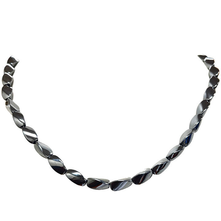 Hématite, perles 'Twist' de 8 x 6 millimètres, vendu en fil de perle, en bracelet de 17 à 21 cm, ou en collier de 42 cm. 3 finitions au choix pour le système de fermeture (Argent, plaqué or, argenté) !
