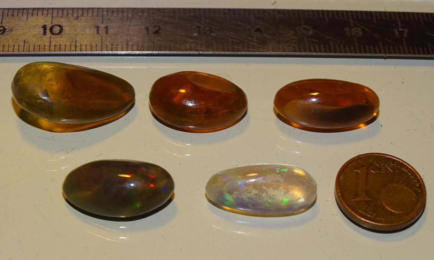 Opale multi-feu, cabochons au choix de 1,9x0,8x7 millimètres à 23x15x0,9. L'authentique et mythique pierre pafait en bijouterie, collection ,exposition...!