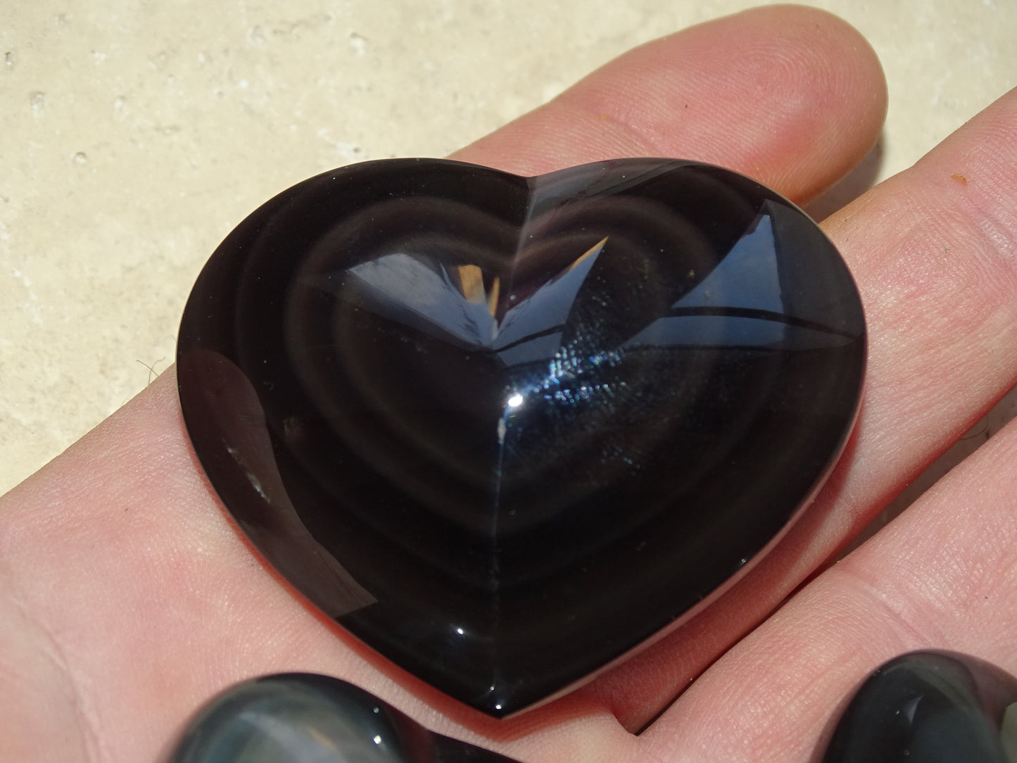 35 to 50 millimeters celestial eye obsidian heart. Beautifully finished, intense reflections, magnificent pieces!