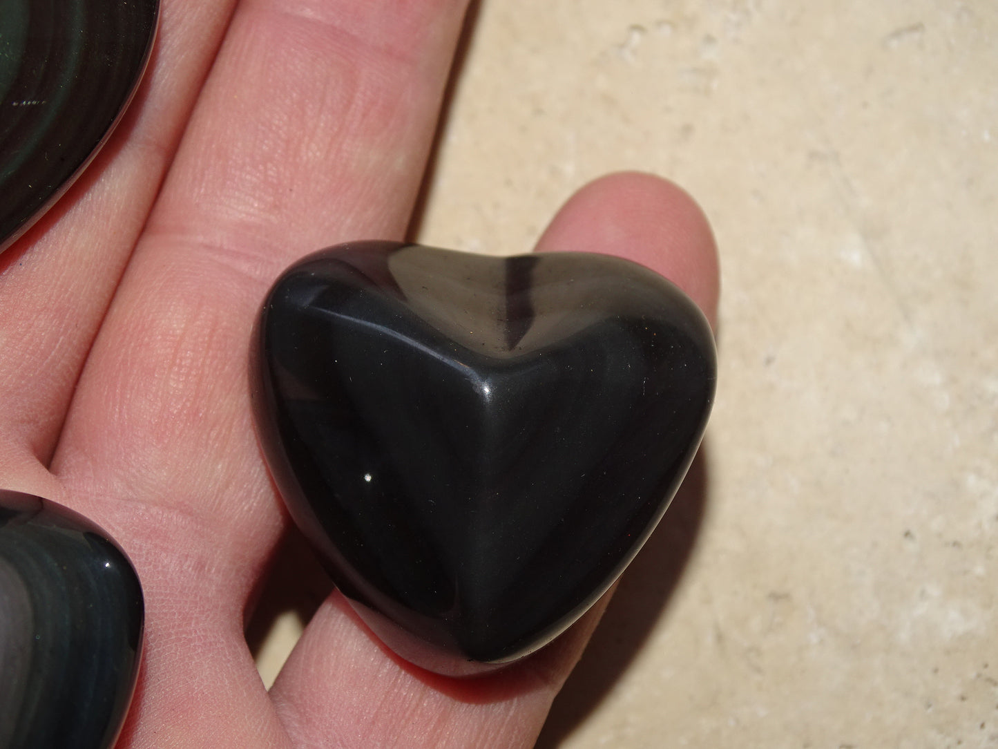 35 to 50 millimeters celestial eye obsidian heart. Beautifully finished, intense reflections, magnificent pieces!