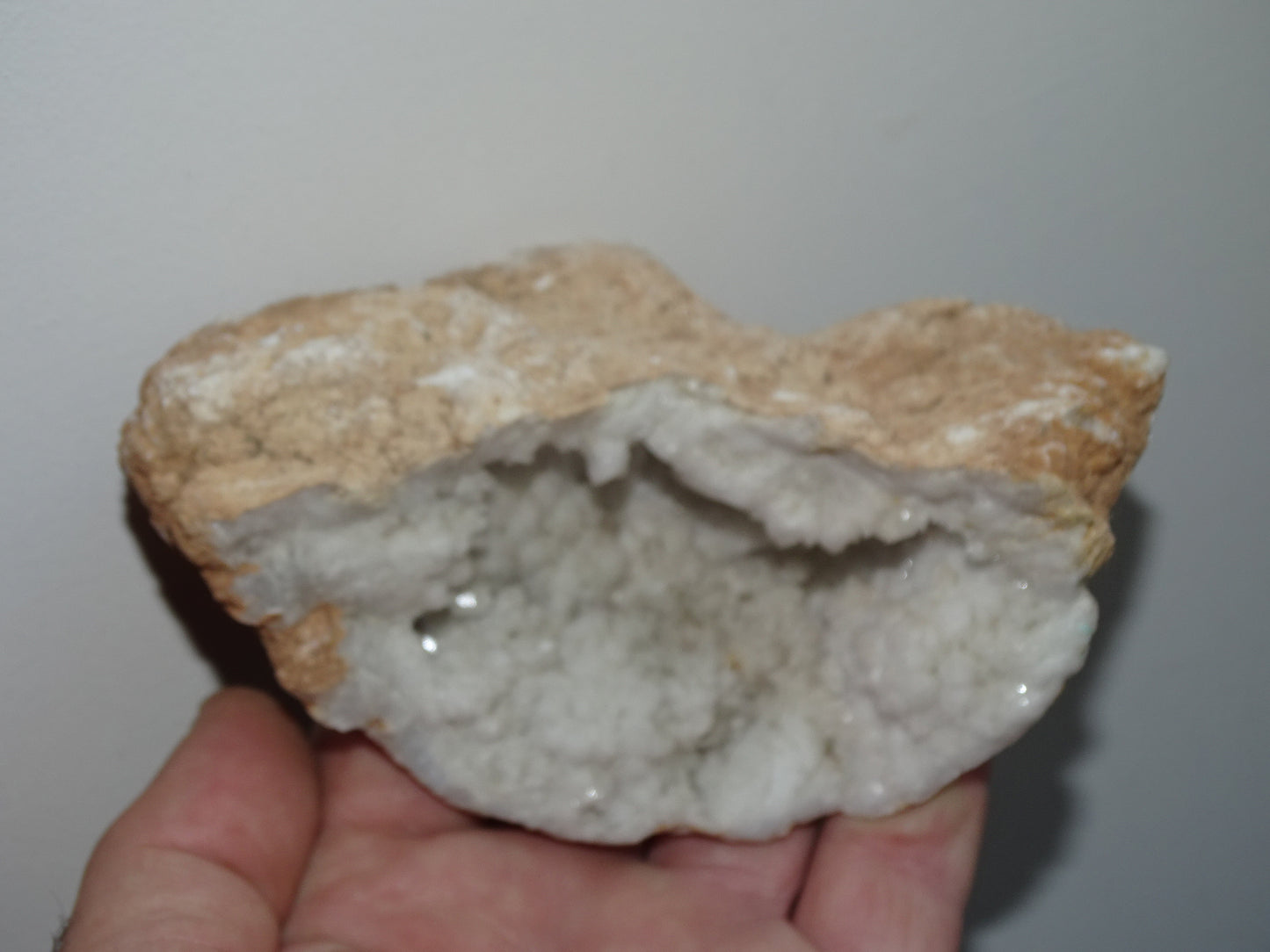 Natural quartz/rock crystal geode measuring 16 L x 13 W x 6 centimetres - 344 grams. Very nice, well-formed piece...!