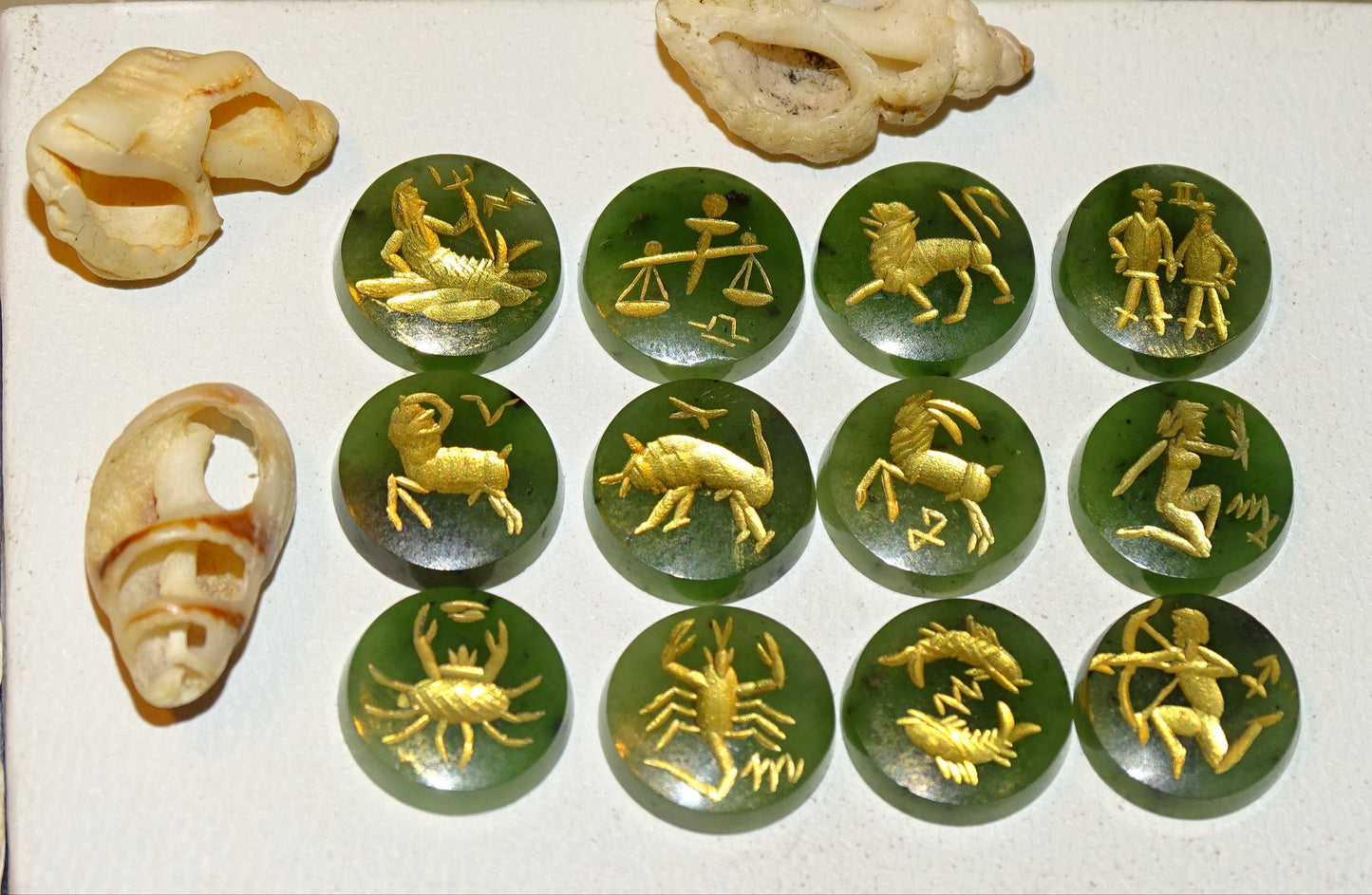 Imperial Jade, set of 12 round stone cabochons with astrological signs engraved in fine gold. Perfect for creating rings or collections... 12 x 3 millimeters thick!