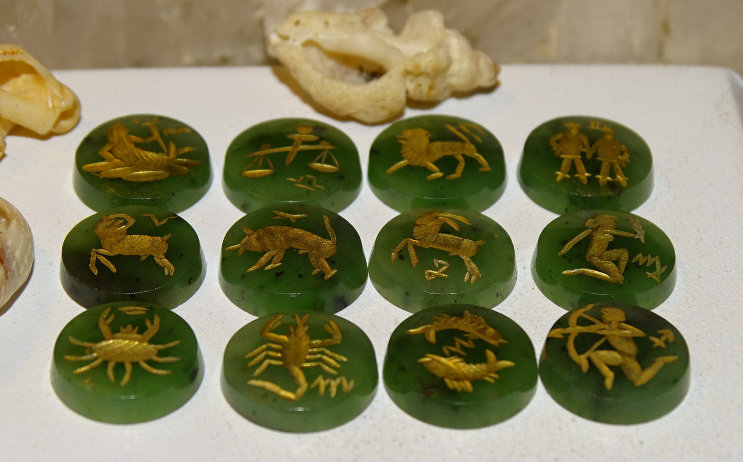 Imperial Jade, set of 12 round stone cabochons with astrological signs engraved in fine gold. Perfect for creating rings or collections... 12 x 3 millimeters thick!