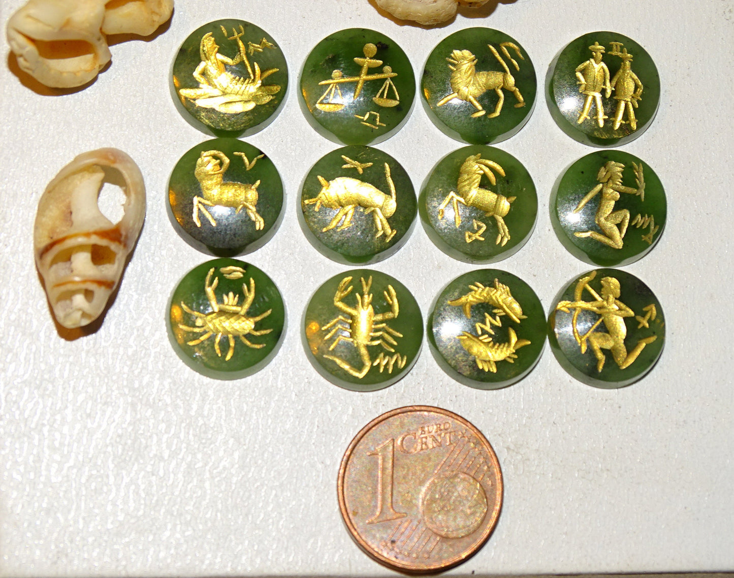 Imperial Jade, set of 12 round stone cabochons with astrological signs engraved in fine gold. Perfect for creating rings or collections... 12 x 3 millimeters thick!