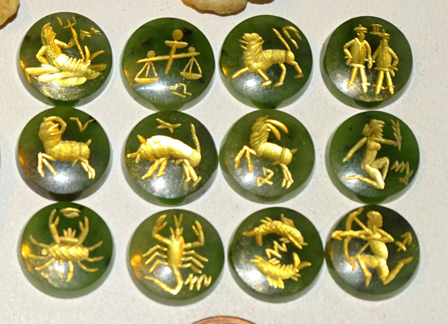 Imperial Jade, set of 12 round stone cabochons with astrological signs engraved in fine gold. Perfect for creating rings or collections... 12 x 3 millimeters thick!