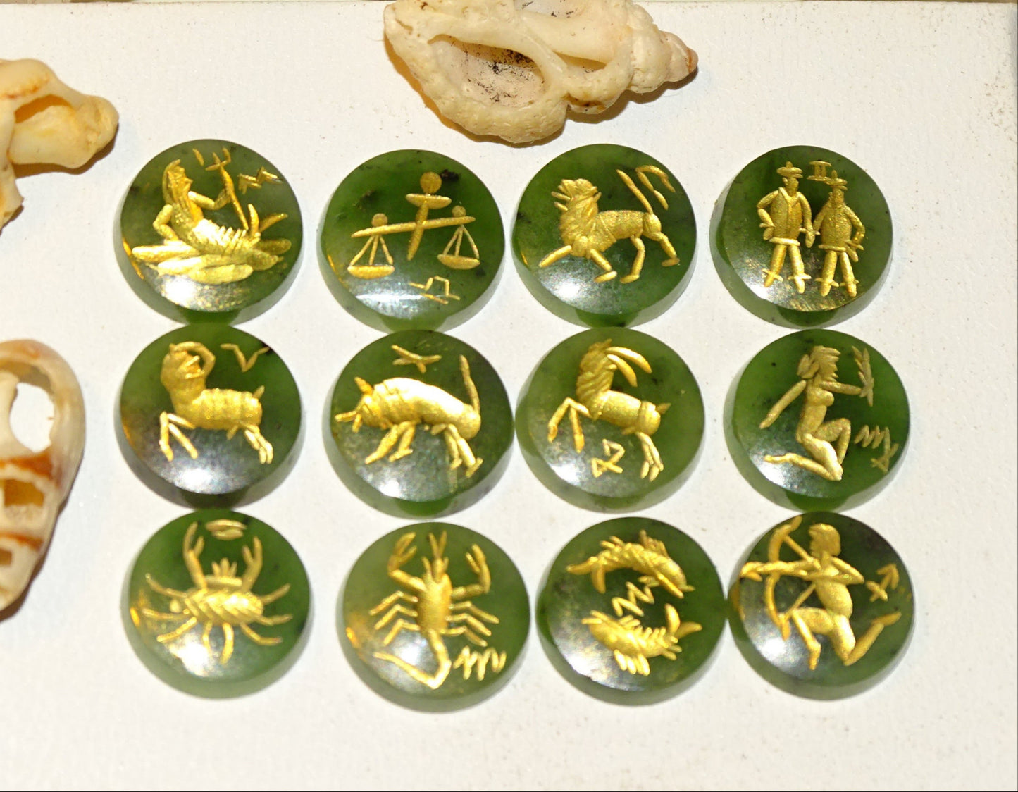 Imperial Jade, set of 12 round stone cabochons with astrological signs engraved in fine gold. Perfect for creating rings or collections... 12 x 3 millimeters thick!