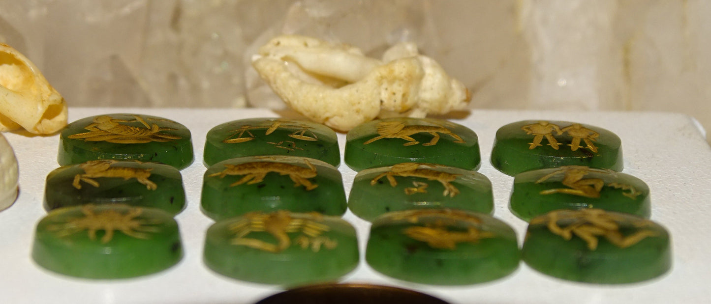 Imperial Jade, set of 12 round stone cabochons with astrological signs engraved in fine gold. Perfect for creating rings or collections... 12 x 3 millimeters thick!