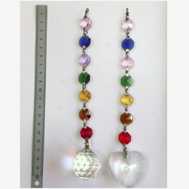 A selection of four Feng Shui crystal garlands in the colors of the 7 chakras! 20 centimeters long - 79 grams. Simple, elegant, and effective!