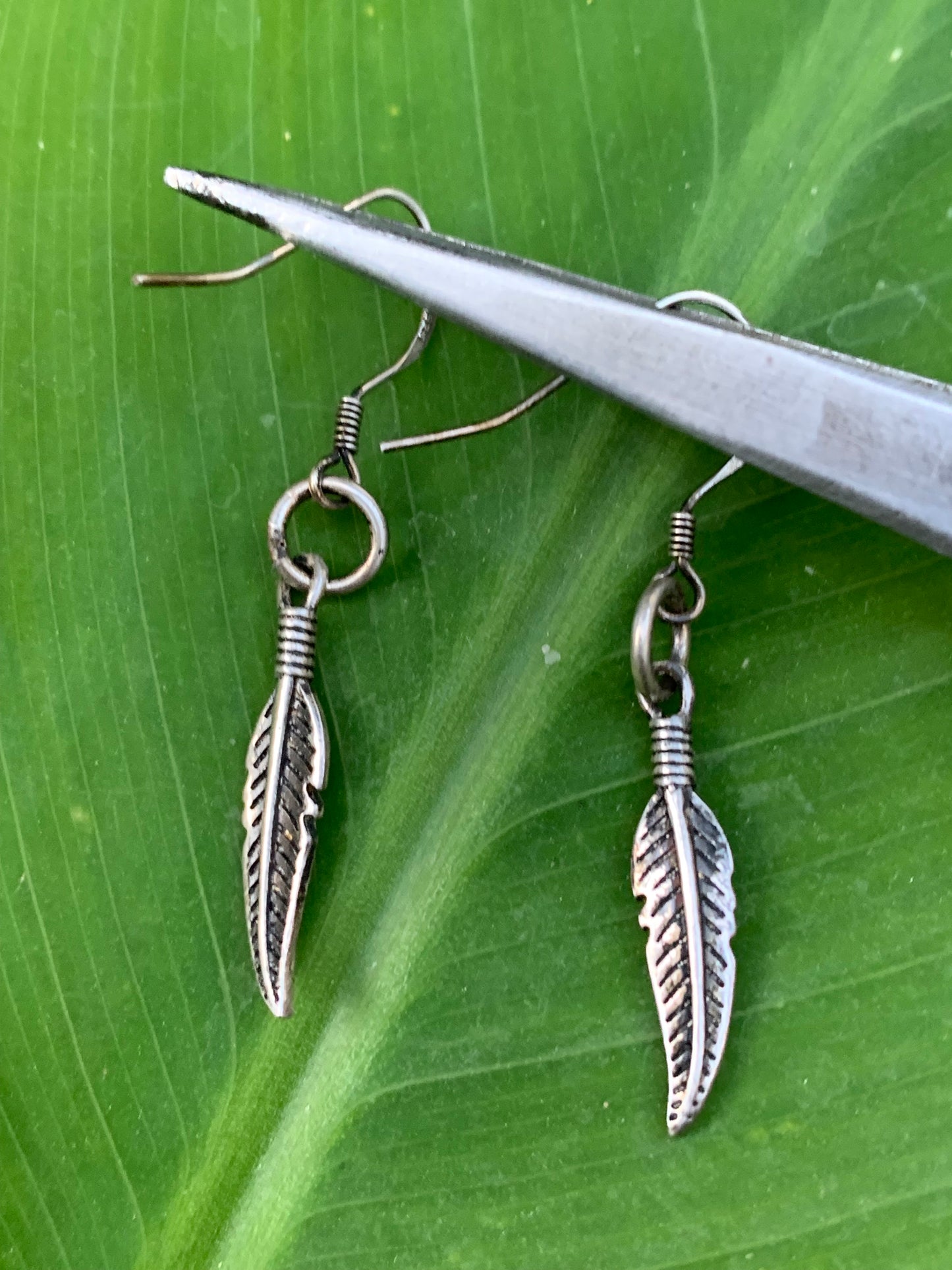 Boucles d'oreilles avec plumes en Argent 0.925, 40 millimètres de longueur, vendu avec bouchon 'stop', parfait !