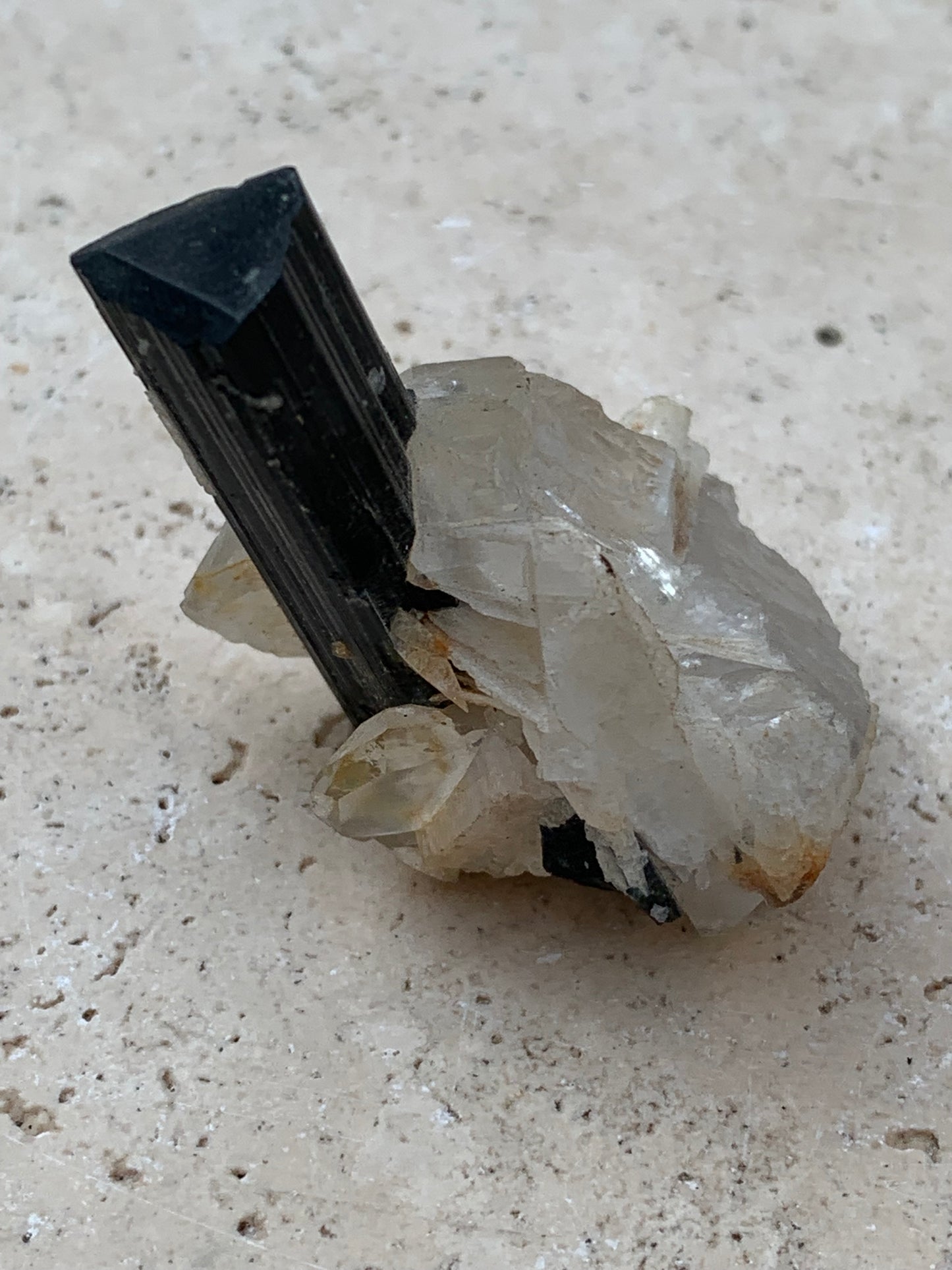 Green Tourmaline/Verdelite on Quartz Crystal, Natural Specimen 46 x 35 x 33 mm - Approximately 27.7 grams. 1 beautiful crystal with a green-terminated tourmaline point running through it!