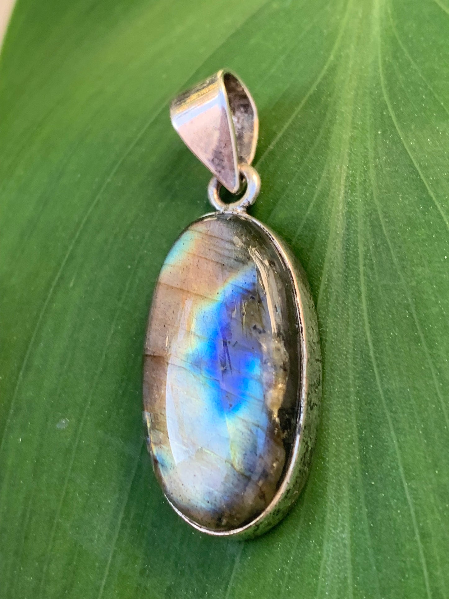 Labradorite, Silver pendant 39mm x 15 x 8. AA to AAA quality, sold with adjustable black cord!