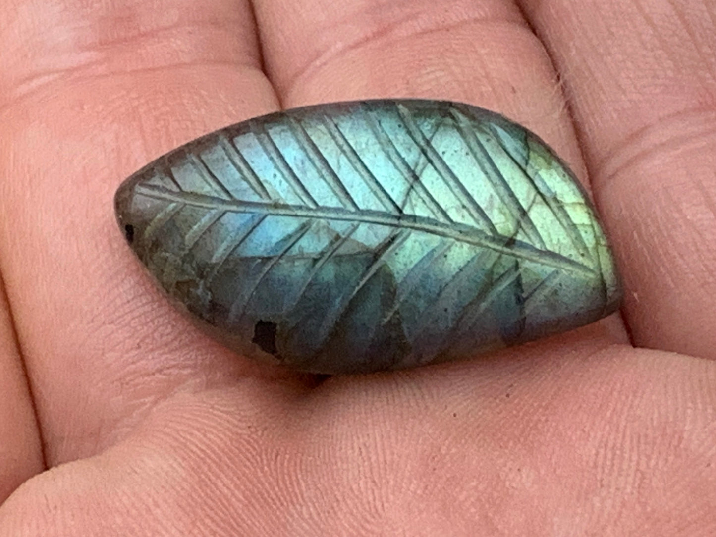 Labradorite, engraved cabochon of 32mm x 16 x 7. AA to AAA quality, perfect for mounting in jewelry or collection!
