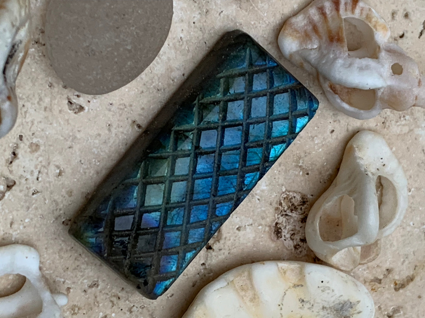 Labradorite, engraved cabochon of 31mm x 14 x 7. AA to AAA quality, perfect for mounting in jewelry or collection!