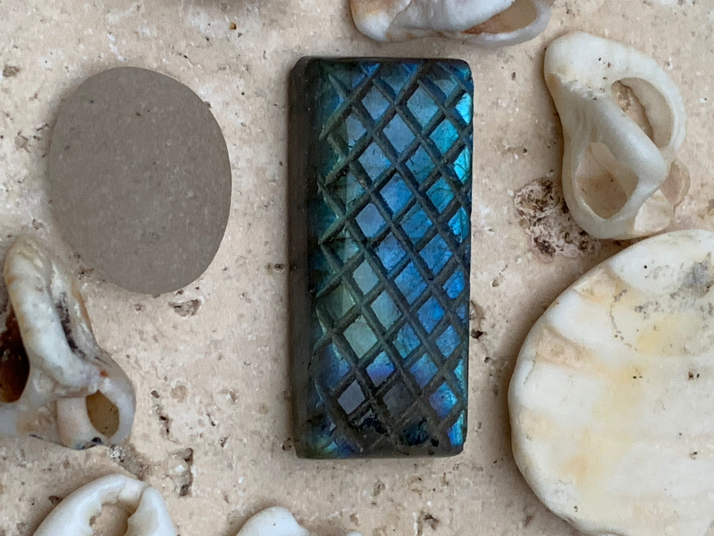 Labradorite, engraved cabochon of 31mm x 14 x 7. AA to AAA quality, perfect for mounting in jewelry or collection!