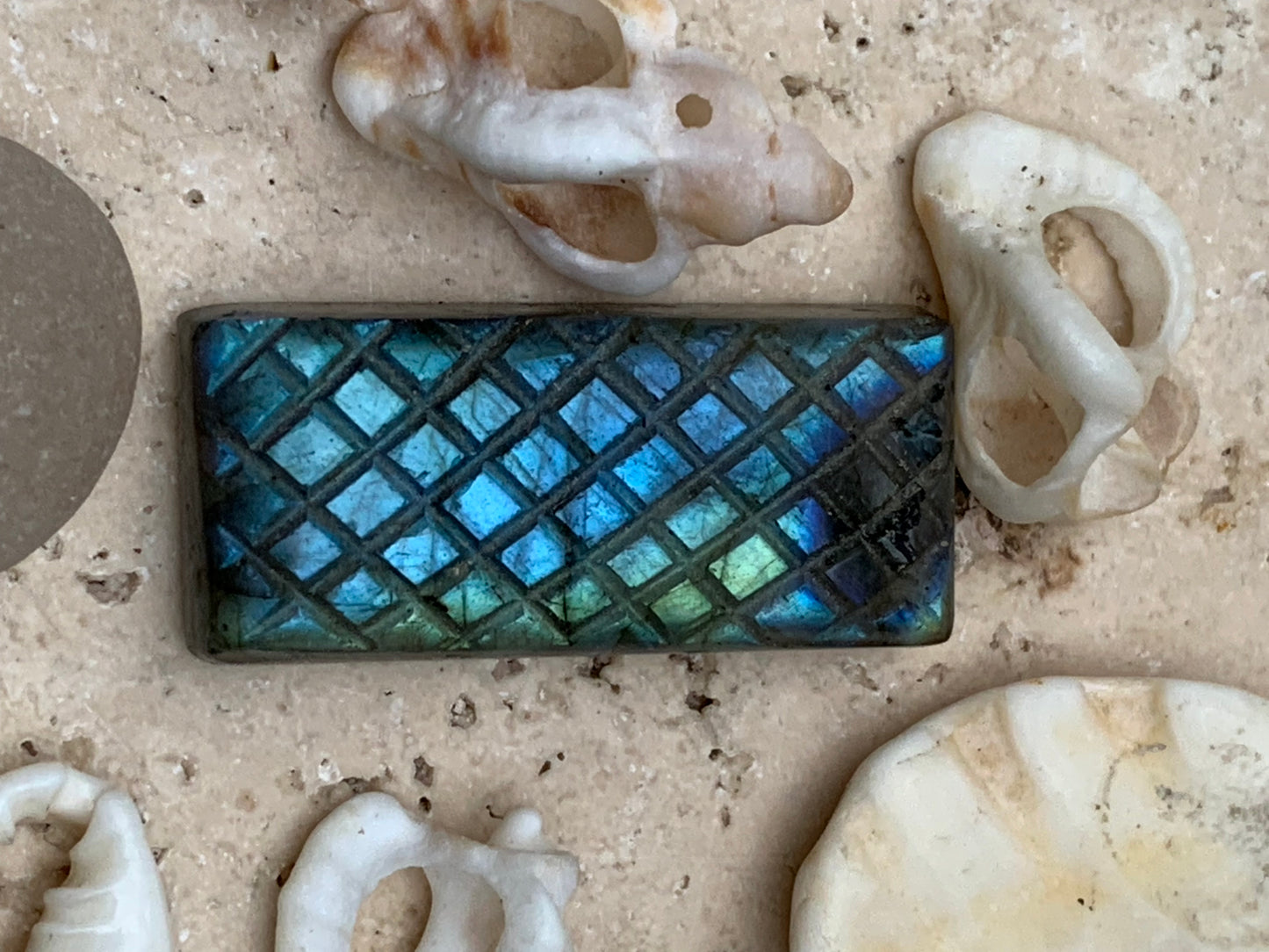 Labradorite, engraved cabochon of 31mm x 14 x 7. AA to AAA quality, perfect for mounting in jewelry or collection!