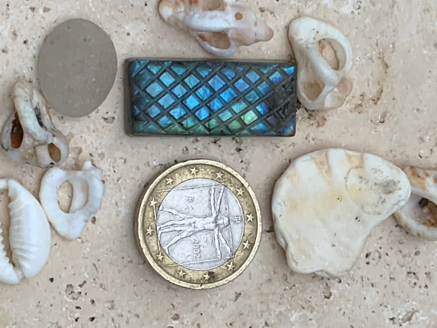 Labradorite, engraved cabochon of 31mm x 14 x 7. AA to AAA quality, perfect for mounting in jewelry or collection!