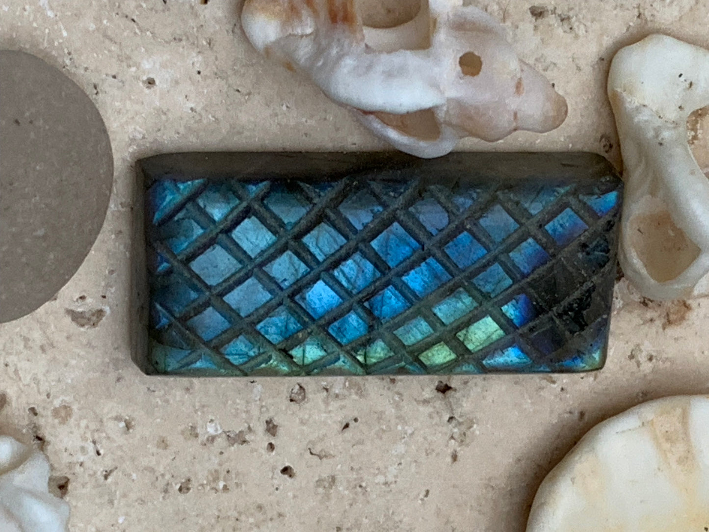 Labradorite, engraved cabochon of 31mm x 14 x 7. AA to AAA quality, perfect for mounting in jewelry or collection!
