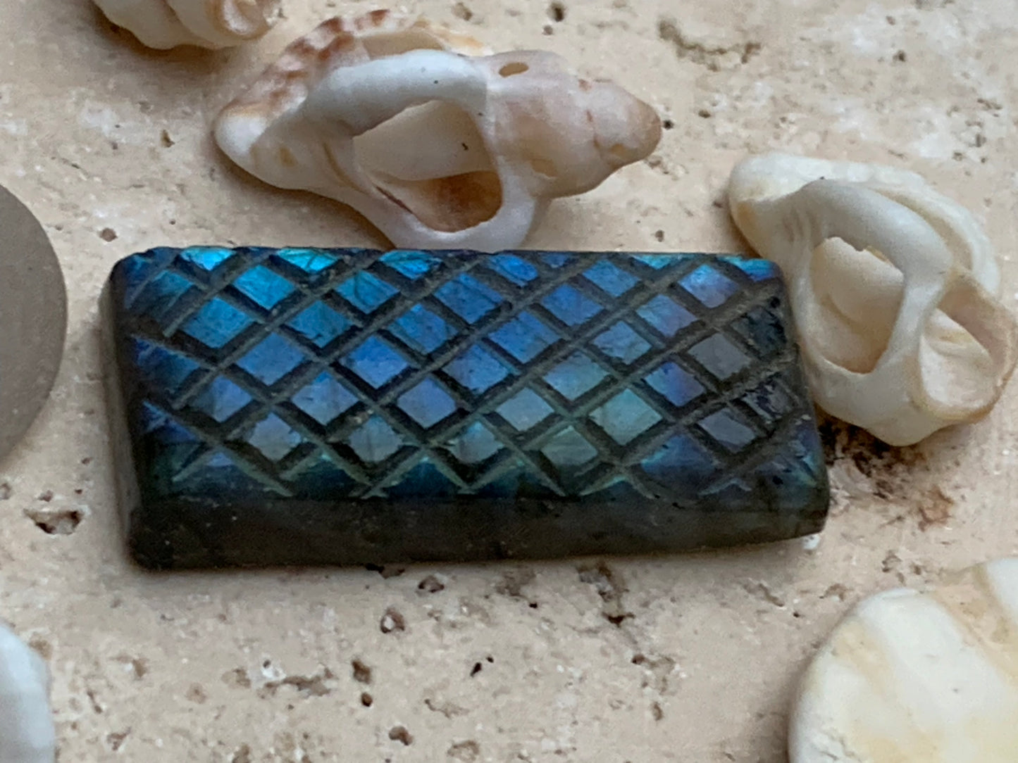 Labradorite, engraved cabochon of 31mm x 14 x 7. AA to AAA quality, perfect for mounting in jewelry or collection!