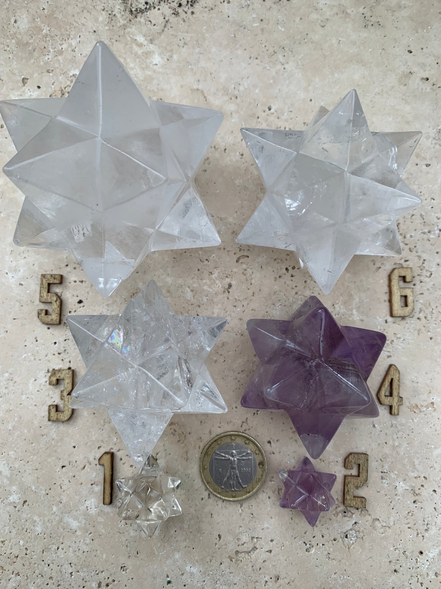 Etoile de Sirius (12 branches) en cristal de roche/ quartz et améthyste. Modèle au choix vendu à l'unité, de 1,5 à 6 cm. Parfait pour l'étude de la géométrie sacré et ses applications !