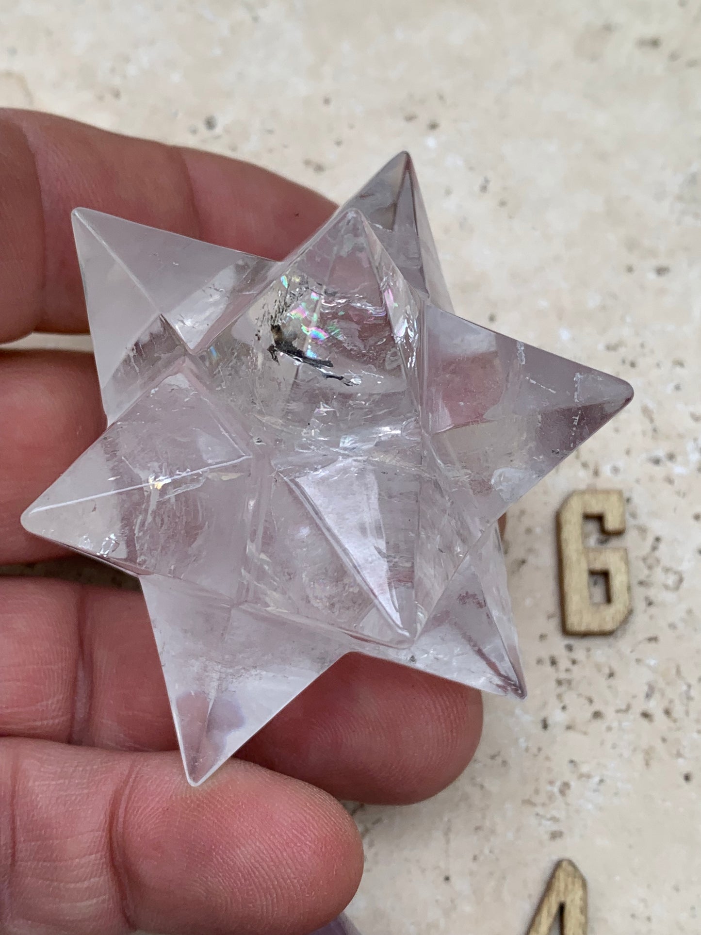 Etoile de Sirius (12 branches) en cristal de roche/ quartz et améthyste. Modèle au choix vendu à l'unité, de 1,5 à 6 cm. Parfait pour l'étude de la géométrie sacré et ses applications !