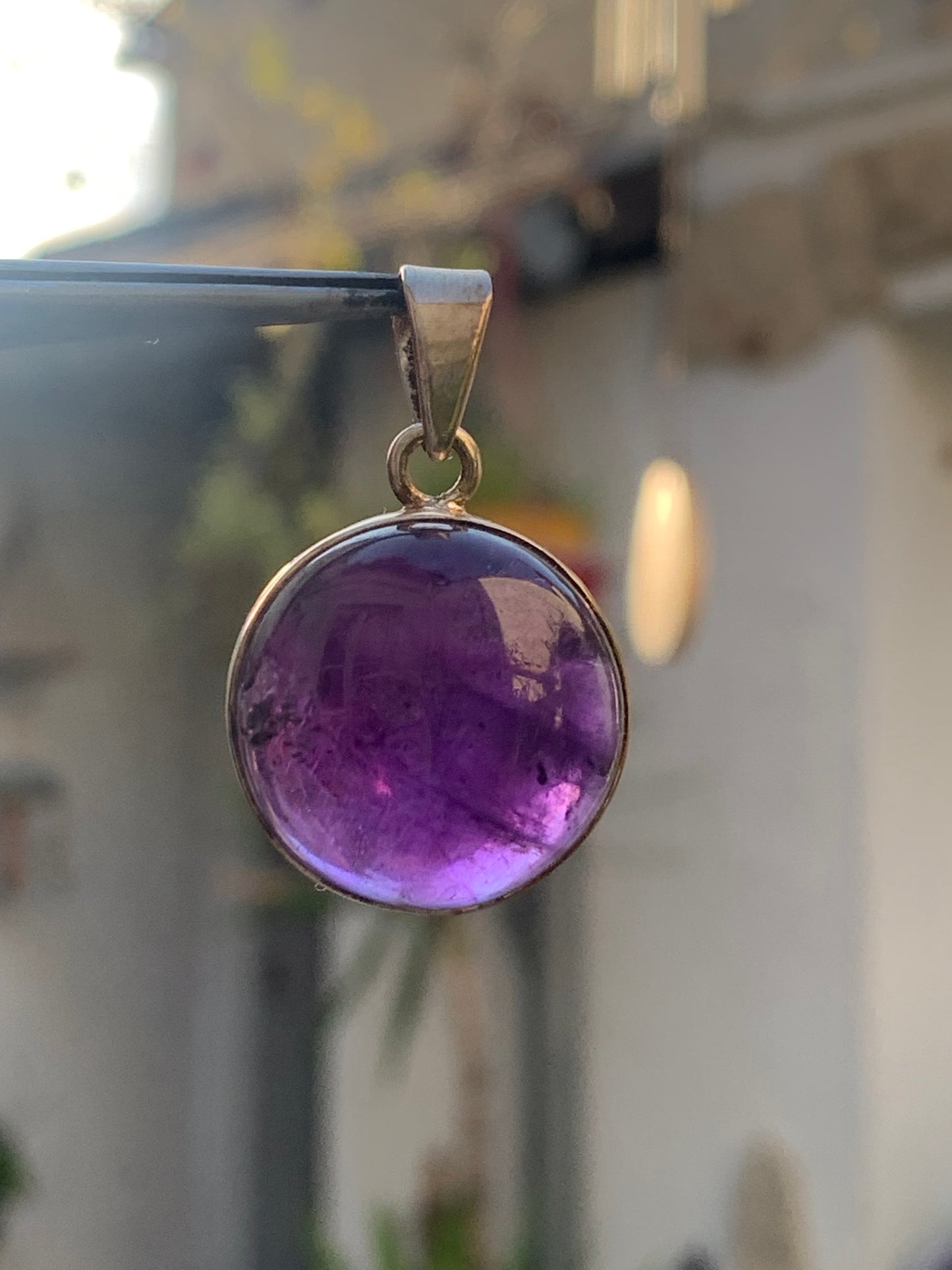 Amethyst, Silver pendant, 34 mm high x 22 mm wide x 10 mm thick. Sold with a free adjustable black cord!