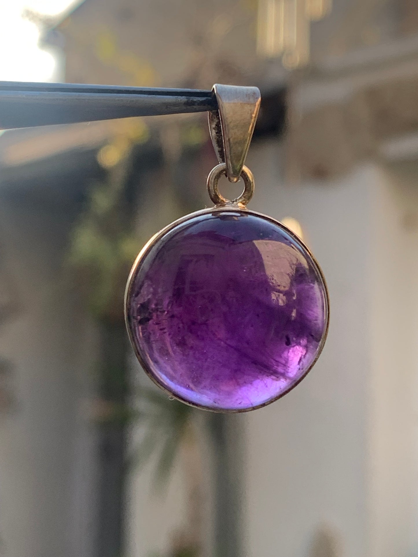 Amethyst, Silver pendant, 34 mm high x 22 mm wide x 10 mm thick. Sold with a free adjustable black cord!