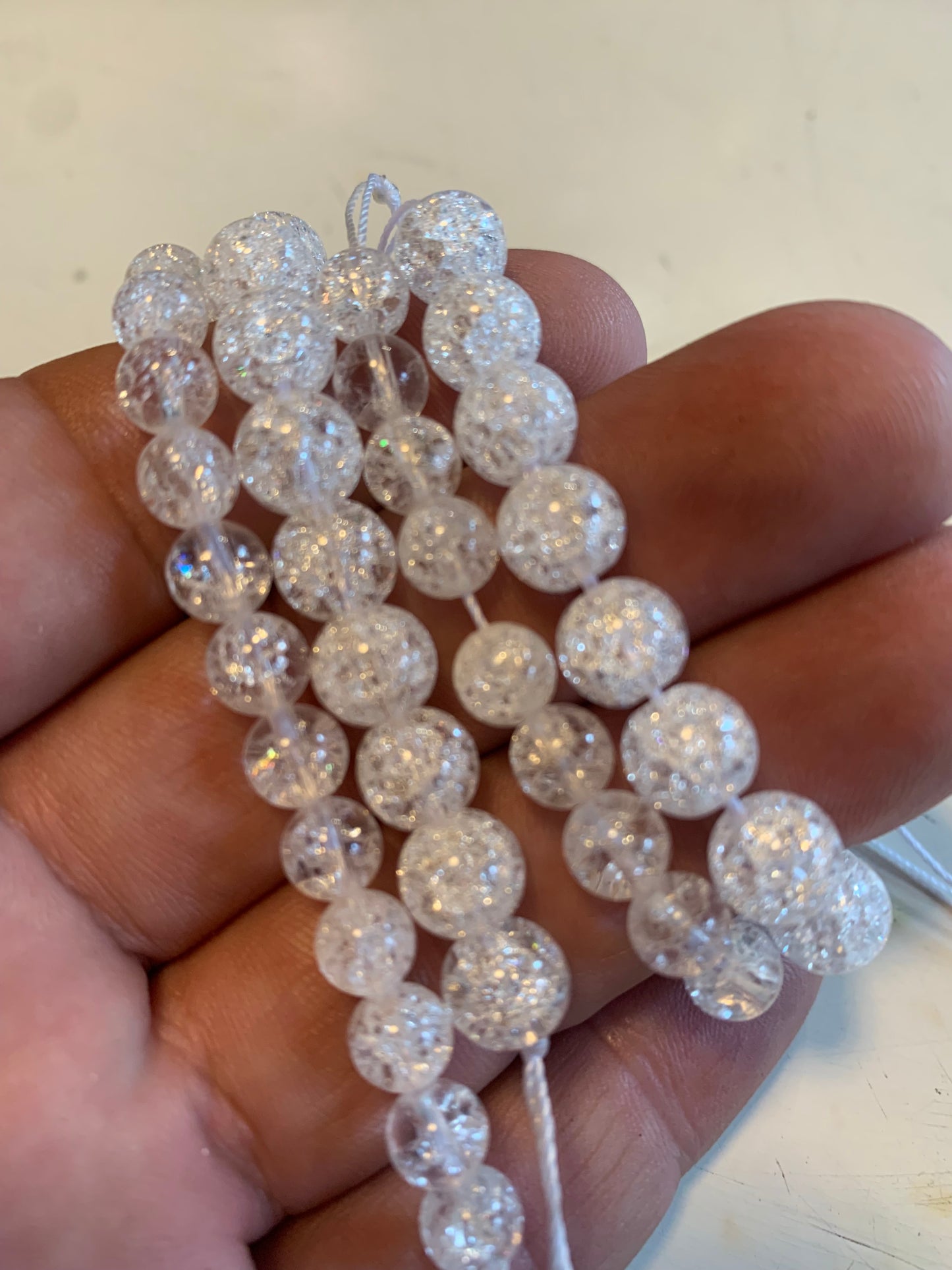 Cristal de roche 'Craquelé' ou 'Neige' (Quartz), perles rondes de 4, 6, 8, 10, 12, 14 mm. Vendu en fil de perle 38/39 cm, en bracelet de 17 à 21 cm, en collier de 45 ou sautoir de 60 cm !