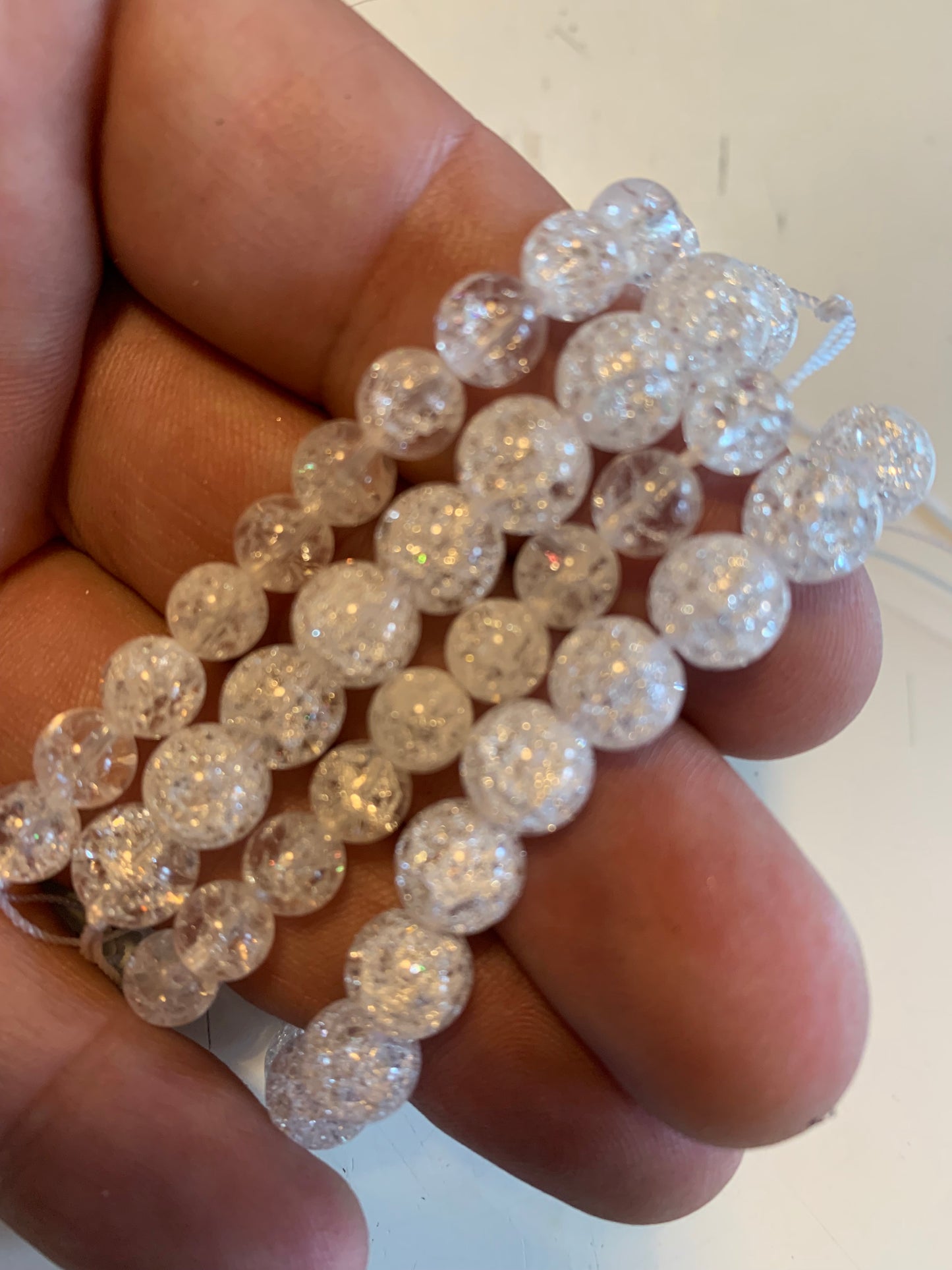 Cristal de roche 'Craquelé' ou 'Neige' (Quartz), perles rondes de 4, 6, 8, 10, 12, 14 mm. Vendu en fil de perle 38/39 cm, en bracelet de 17 à 21 cm, en collier de 45 ou sautoir de 60 cm !