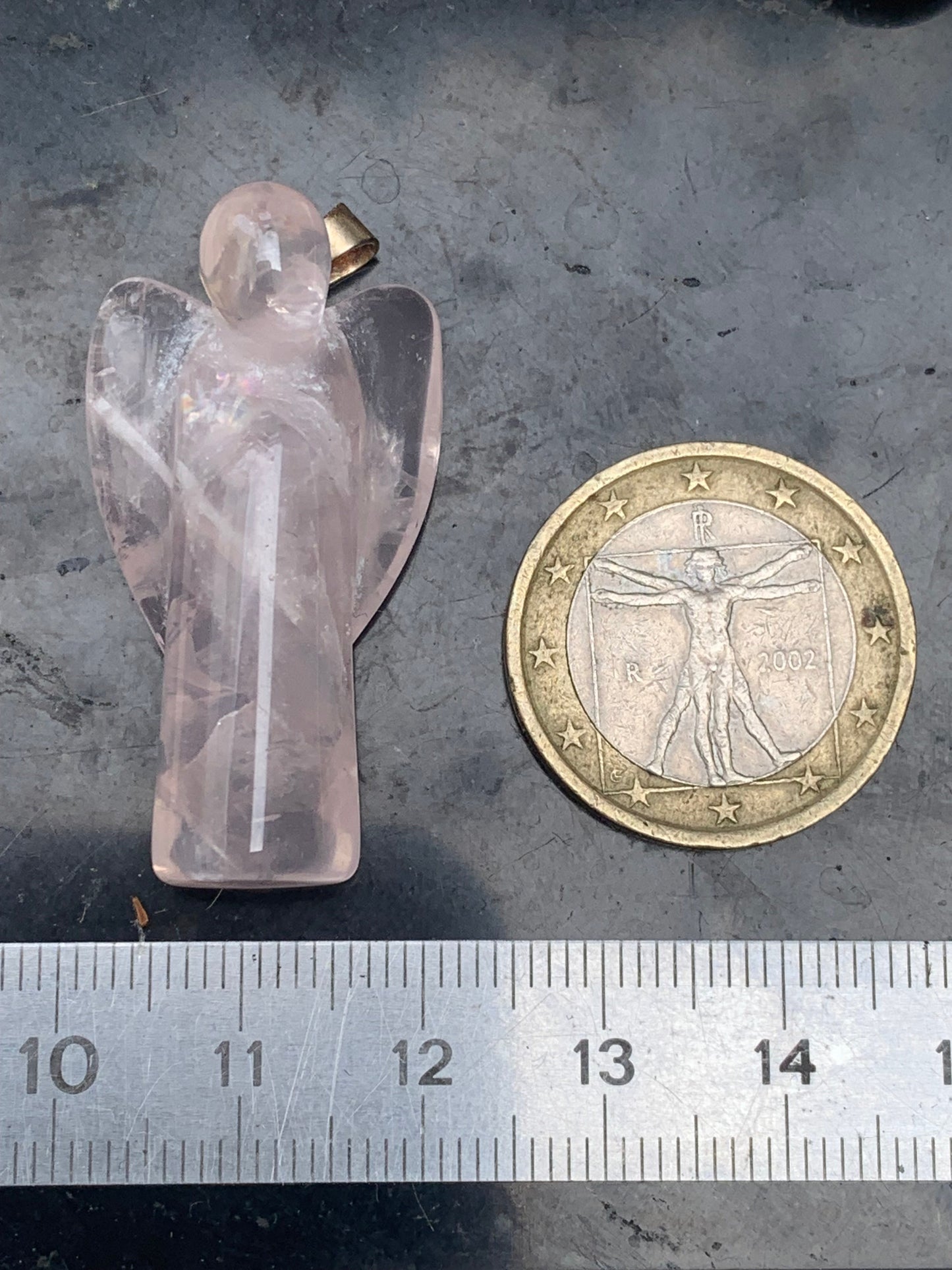 Rock crystal/Rose quartz! 'Angel' pendant measuring 40mm high x 18mm wide x 14mm thick. Sold with an adjustable black cord!