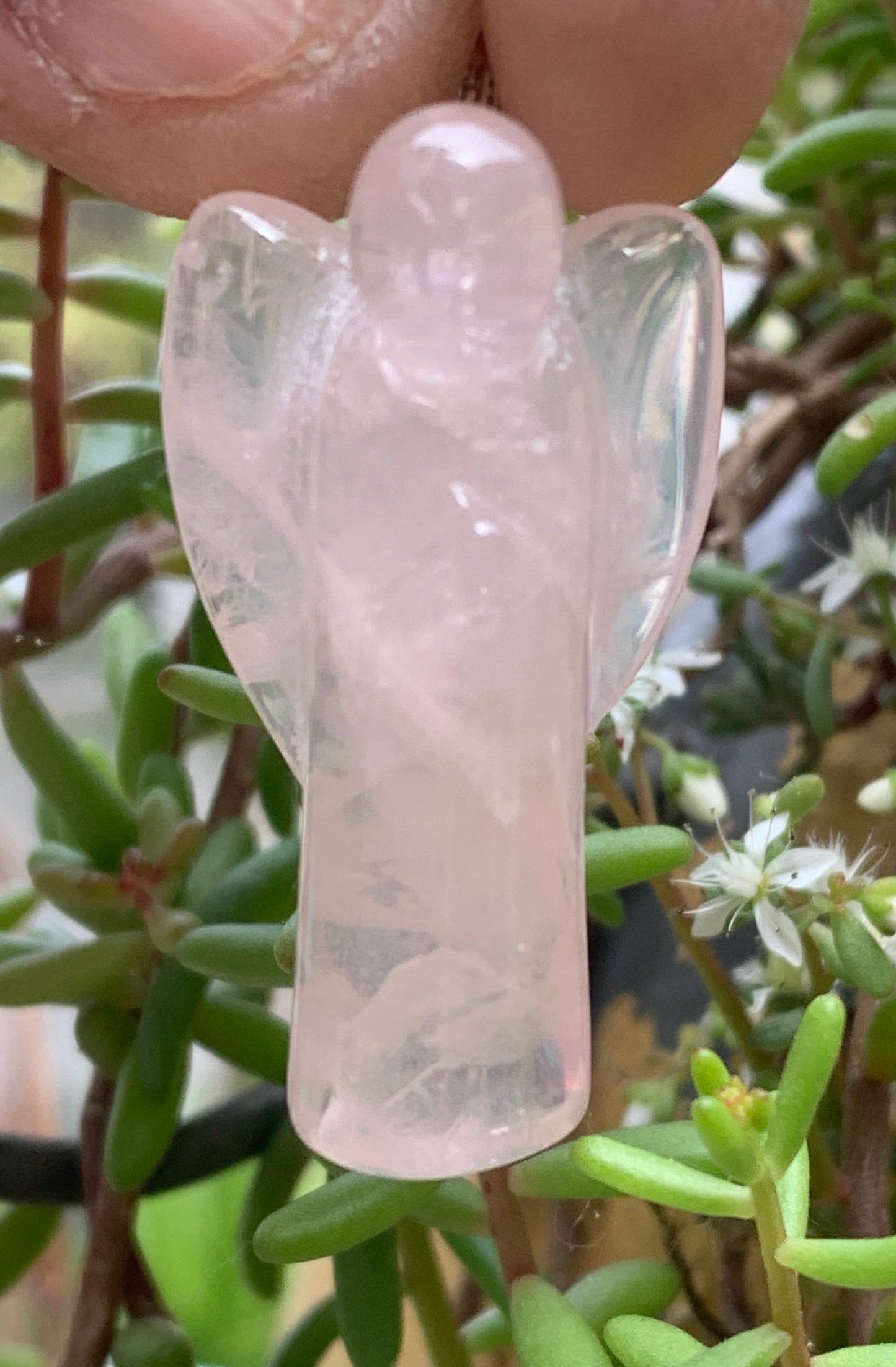Rock crystal/Rose quartz! 'Angel' pendant measuring 40mm high x 18mm wide x 14mm thick. Sold with an adjustable black cord!