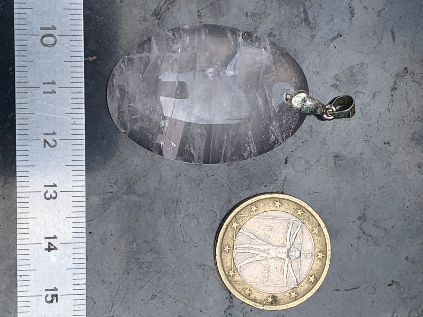 Rock crystal/Rose quartz! Pendant measuring 50mm high x 28mm wide x 8mm thick. Sold with an adjustable black cord!