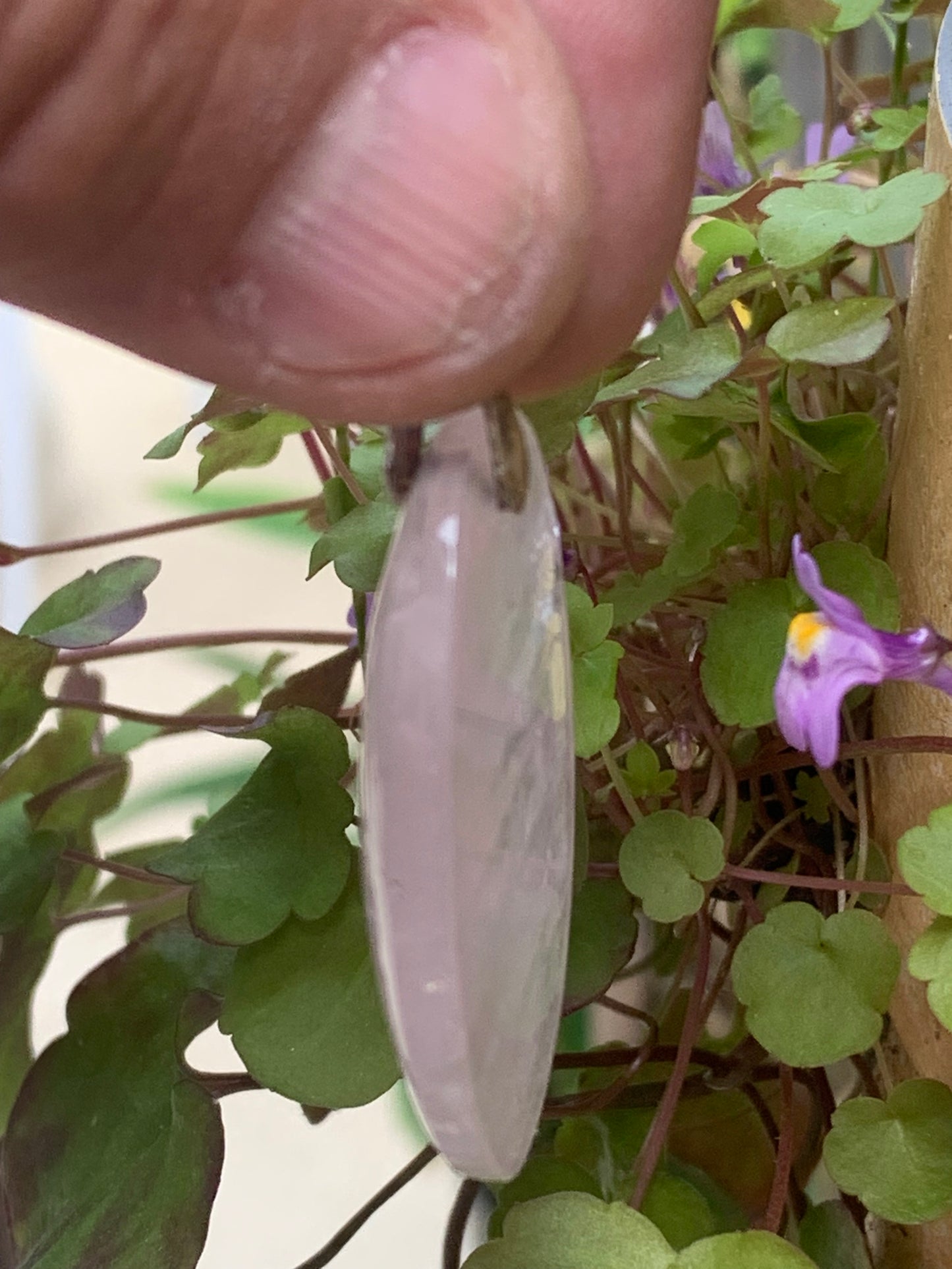 Rock crystal/Rose quartz! Pendant measuring 50mm high x 28mm wide x 8mm thick. Sold with an adjustable black cord!