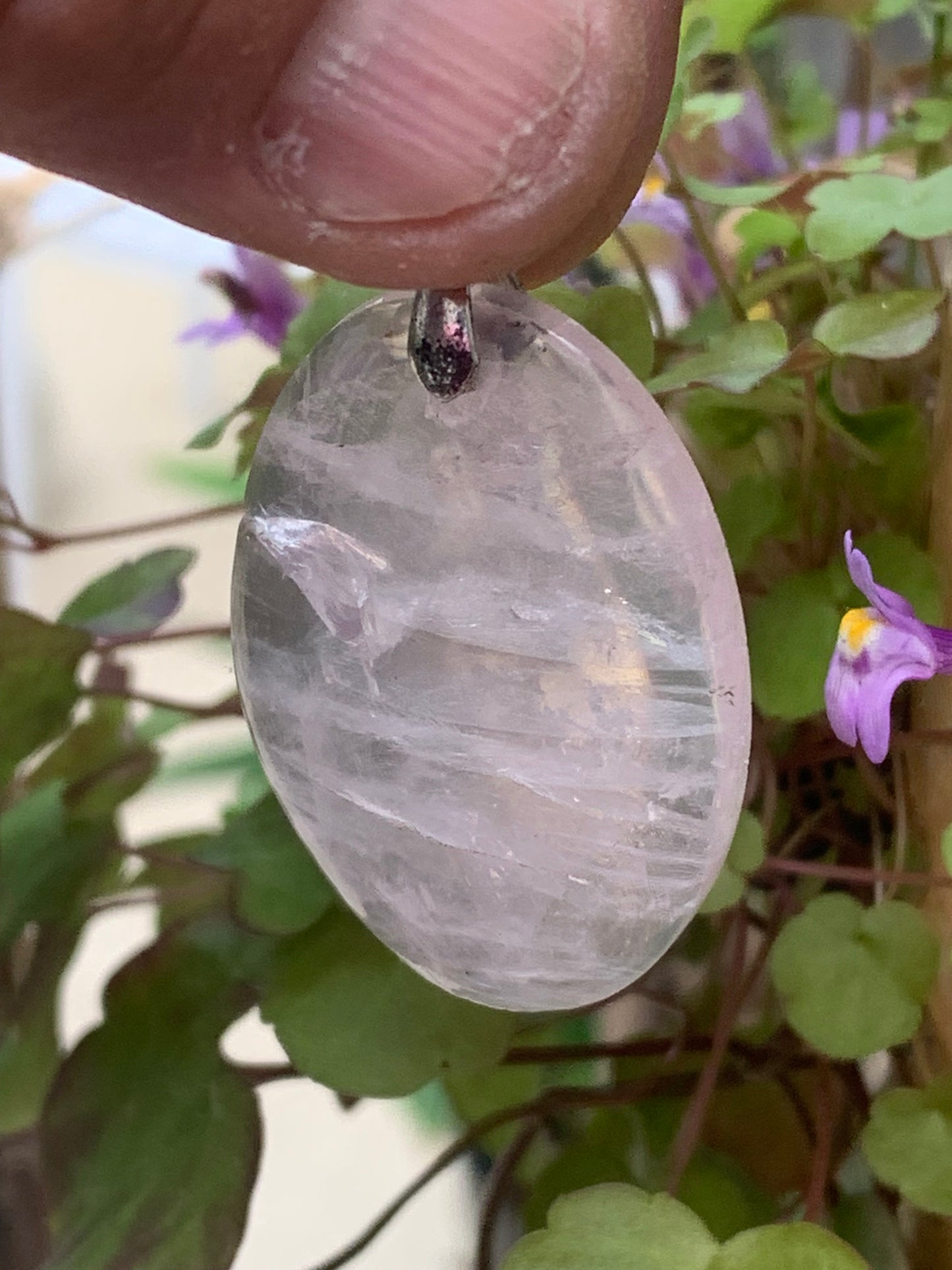 Rock crystal/Rose quartz! Pendant measuring 50mm high x 28mm wide x 8mm thick. Sold with an adjustable black cord!
