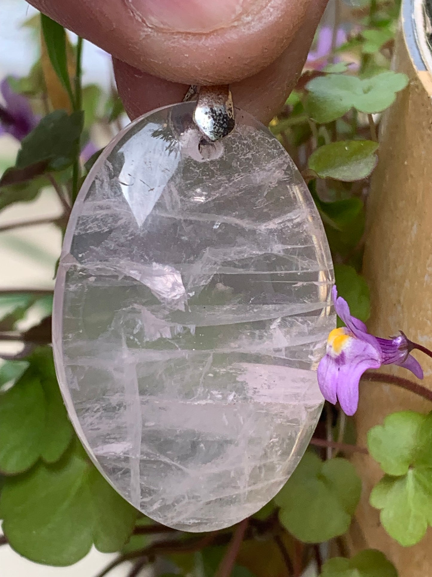 Rock crystal/Rose quartz! Pendant measuring 50mm high x 28mm wide x 8mm thick. Sold with an adjustable black cord!