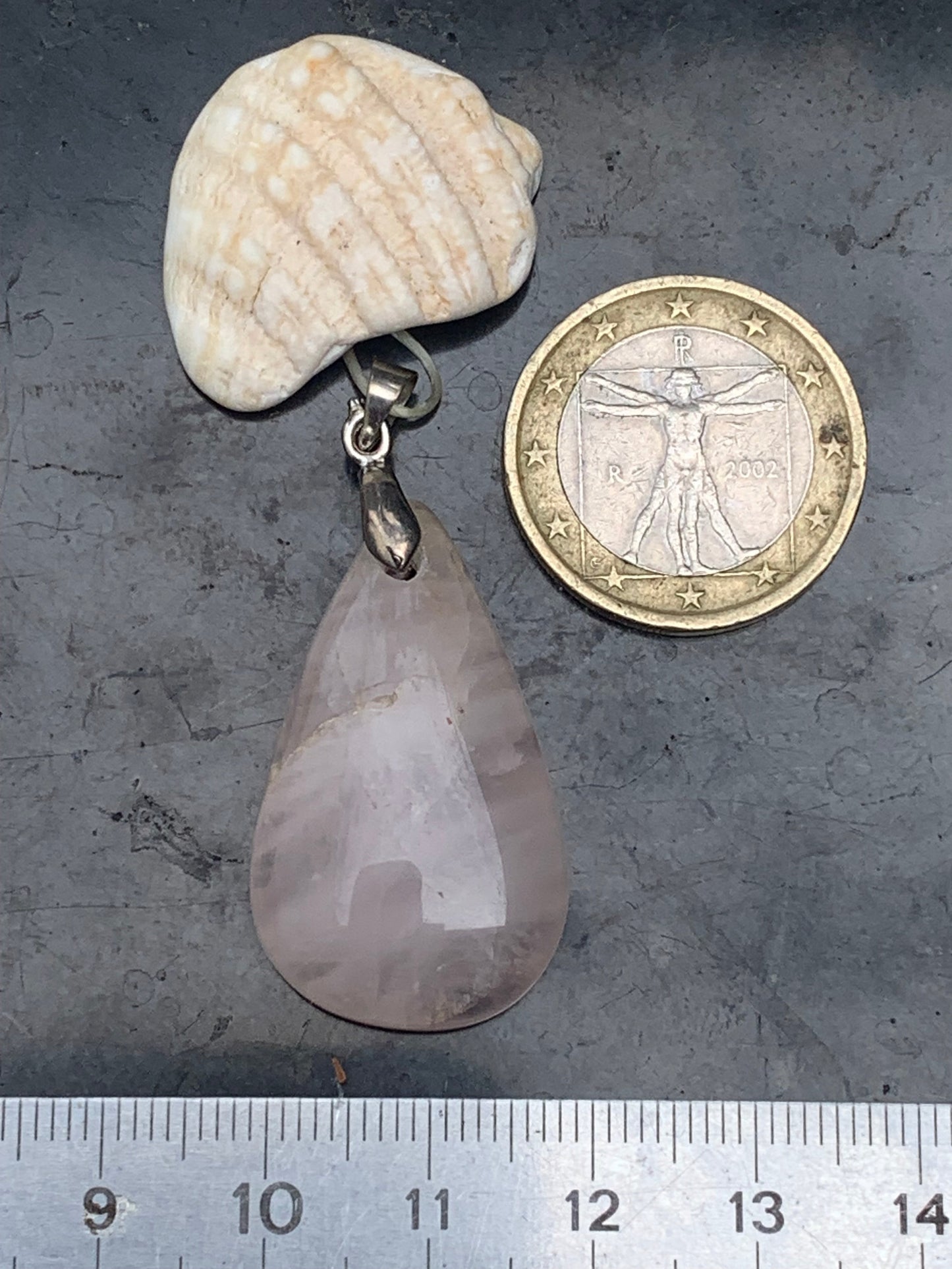 Rock crystal/Rose quartz! Pendant measuring 43mm high x 20mm wide x 8mm thick. Sold with an adjustable black cord!