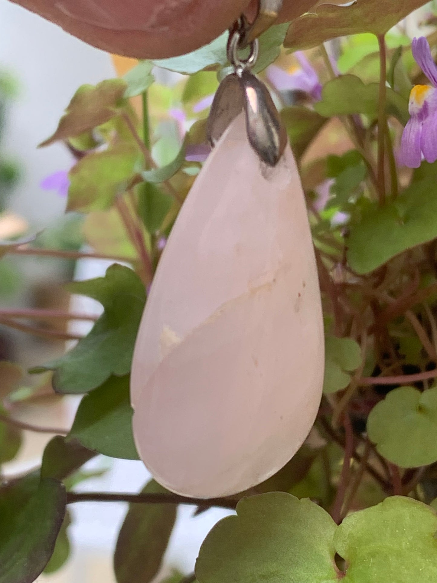 Rock crystal/Rose quartz! Pendant measuring 43mm high x 20mm wide x 8mm thick. Sold with an adjustable black cord!