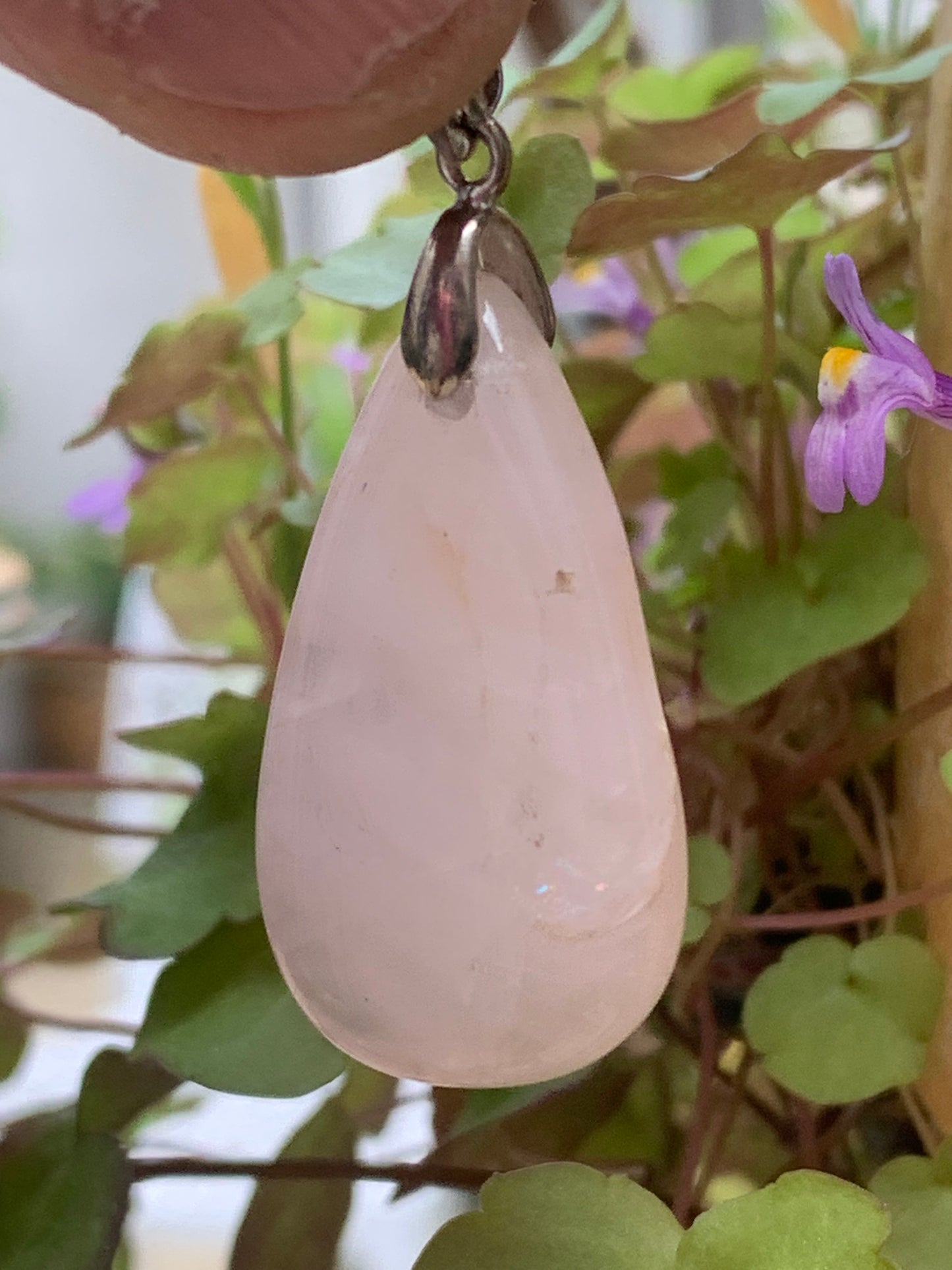 Rock crystal/Rose quartz! Pendant measuring 43mm high x 20mm wide x 8mm thick. Sold with an adjustable black cord!