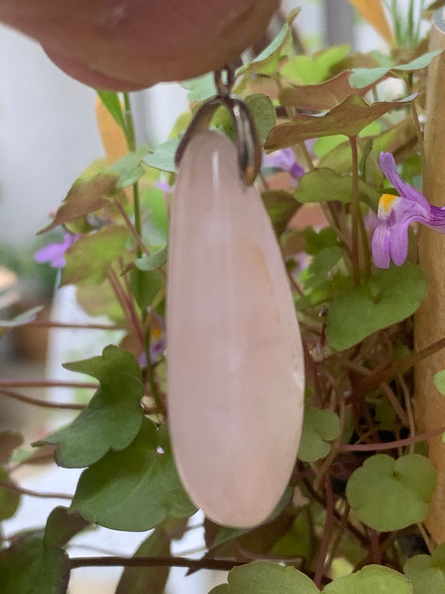 Rock crystal/Rose quartz! Pendant measuring 43mm high x 20mm wide x 8mm thick. Sold with an adjustable black cord!