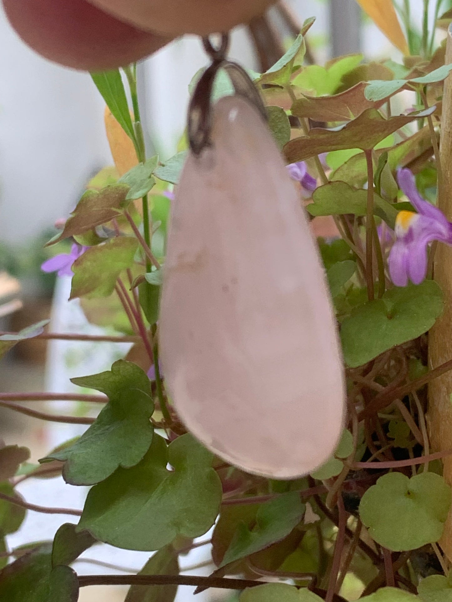 Rock crystal/Rose quartz! Pendant measuring 43mm high x 20mm wide x 8mm thick. Sold with an adjustable black cord!