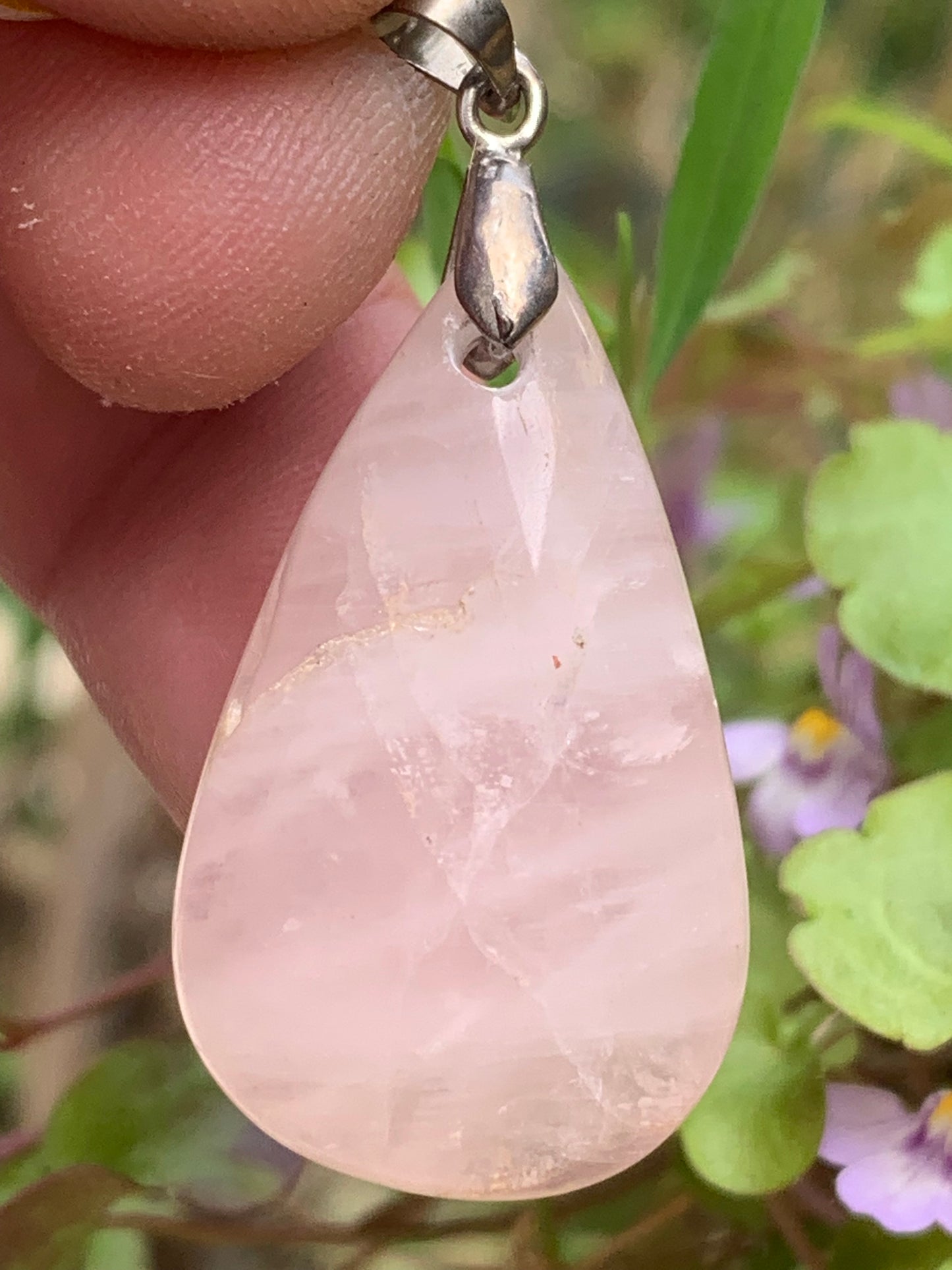 Rock crystal/Rose quartz! Pendant measuring 43mm high x 20mm wide x 8mm thick. Sold with an adjustable black cord!